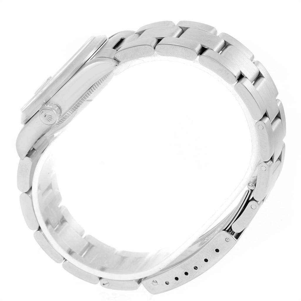 This image shows the left side view of a Rolex Mid-Size 68240 Women's Stainless Steel Black Dial 68240 Women's Stainless Steel Black Dial model, focusing on the bracelet and crown.