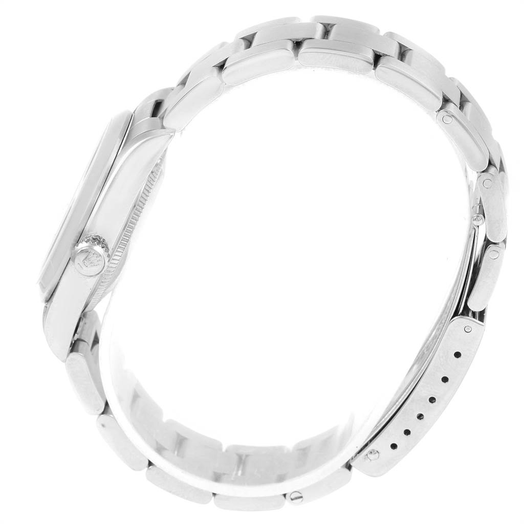 This image shows the side view of the Rolex Mid-Size 78240 Men's Stainless Steel Silver Dial 78240 Men's Stainless Steel Silver Dial watch, highlighting the case, crown, and bracelet.