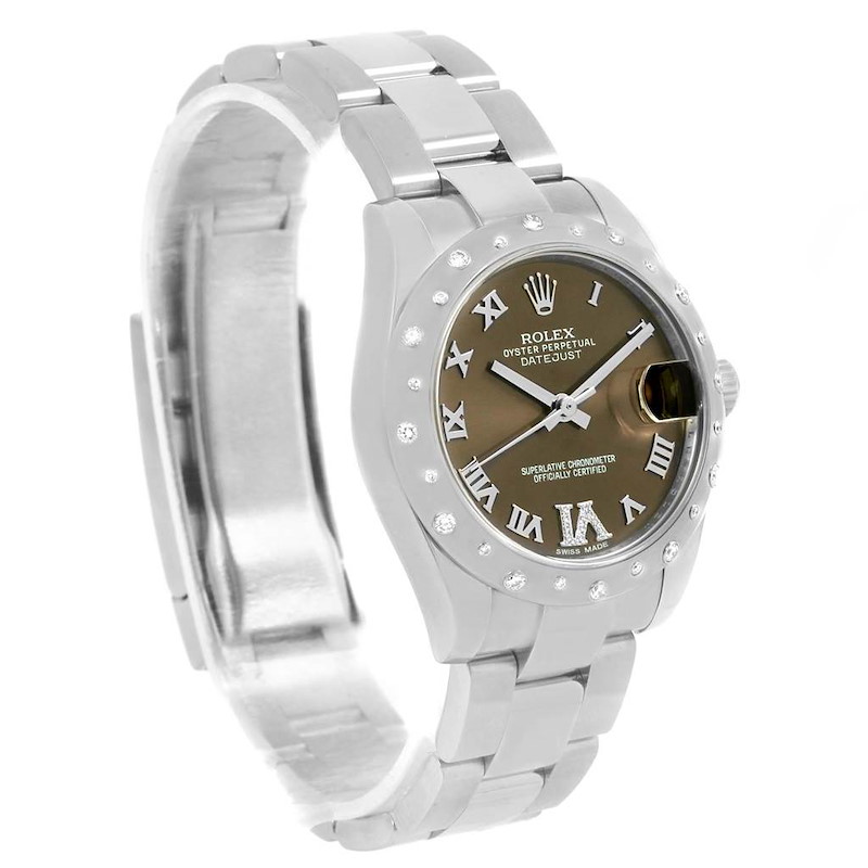 The image shows a Mid-Size Rolex Oyster Perpetual Datejust watch at an angle emphasizing its face, bezel, and part of the bracelet.