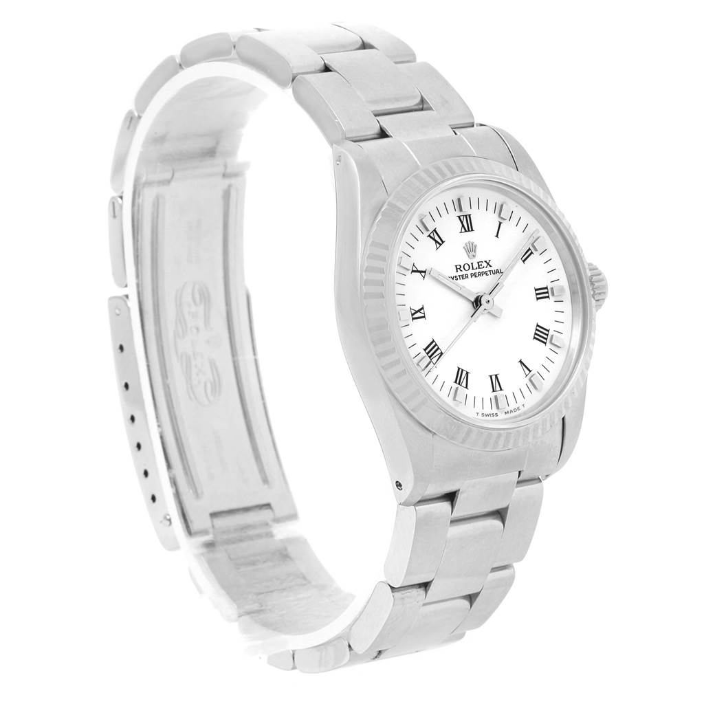 The image shows a side angle of a Rolex Mid-Size 67514 Women's Stainless Steel White Dial 67514 Women's Stainless Steel White Dial watch, featuring the full bracelet and face with Roman numerals.