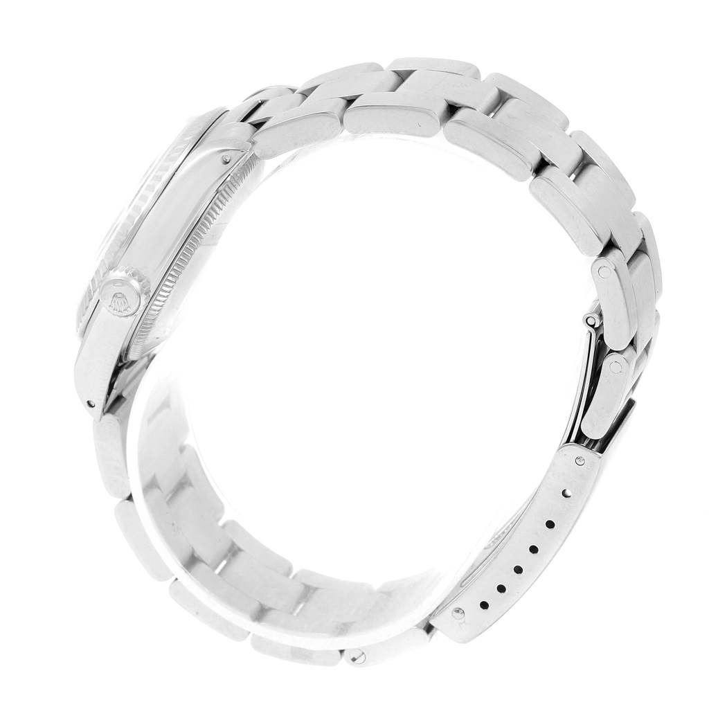 The image shows a side profile of a Mid-Size Rolex watch, focusing on the bracelet and clasp.