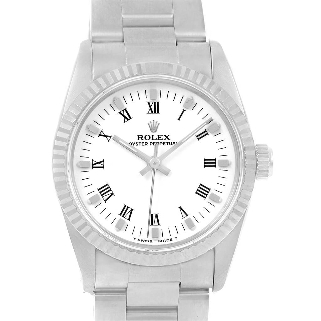 The image shows a front view of a Mid-Size Rolex Oyster Perpetual watch, highlighting its dial, bezel, and bracelet.