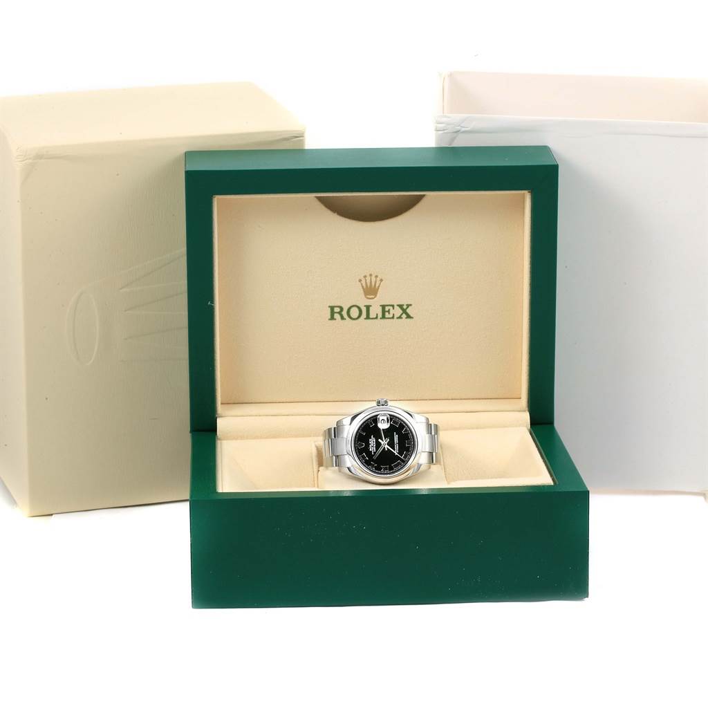 The Rolex Mid-Size 178240 Women's Stainless Steel Black Dial 178240 Women's Stainless Steel Black Dial model watch is displayed front-facing in an open green and beige branded box.