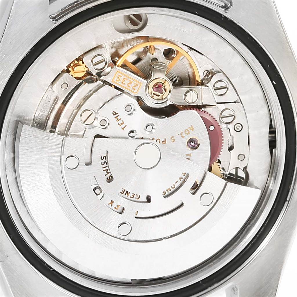 The image shows the internal mechanism and movement of a Rolex Mid-Size 178240 Women's Stainless Steel Black Dial 178240 Women's Stainless Steel Black Dial model watch from a close-up, rear angle.