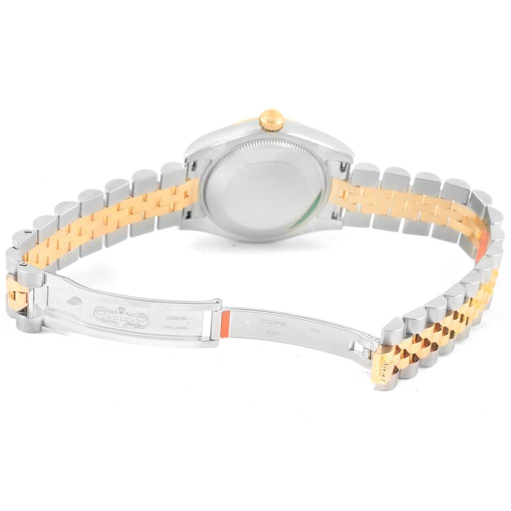 This image shows the back and clasp of a Mid-Size Rolex watch, featuring a two-tone bracelet and closed deployment buckle.