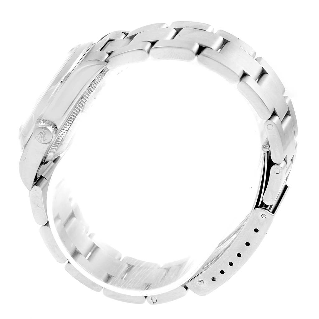 This image shows a side profile of a Mid-Size Rolex watch, showcasing its bracelet, clasp, and crown.