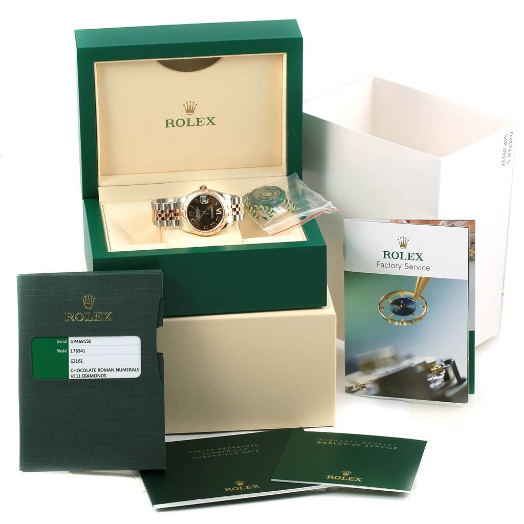 The image shows a Rolex Mid-Size 178341 Women's Steel and Gold (two tone) Brown Dial 178341 Women's Steel and Gold (two tone) Brown Dial watch set in its open box, with accompanying documents and accessories laid out.