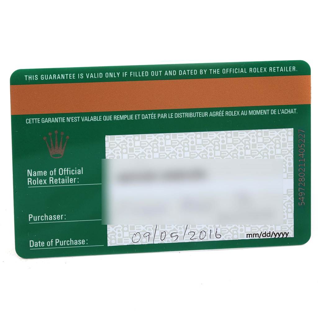 This is a guarantee card for a Mid-Size Rolex watch, shown from a top-down angle.