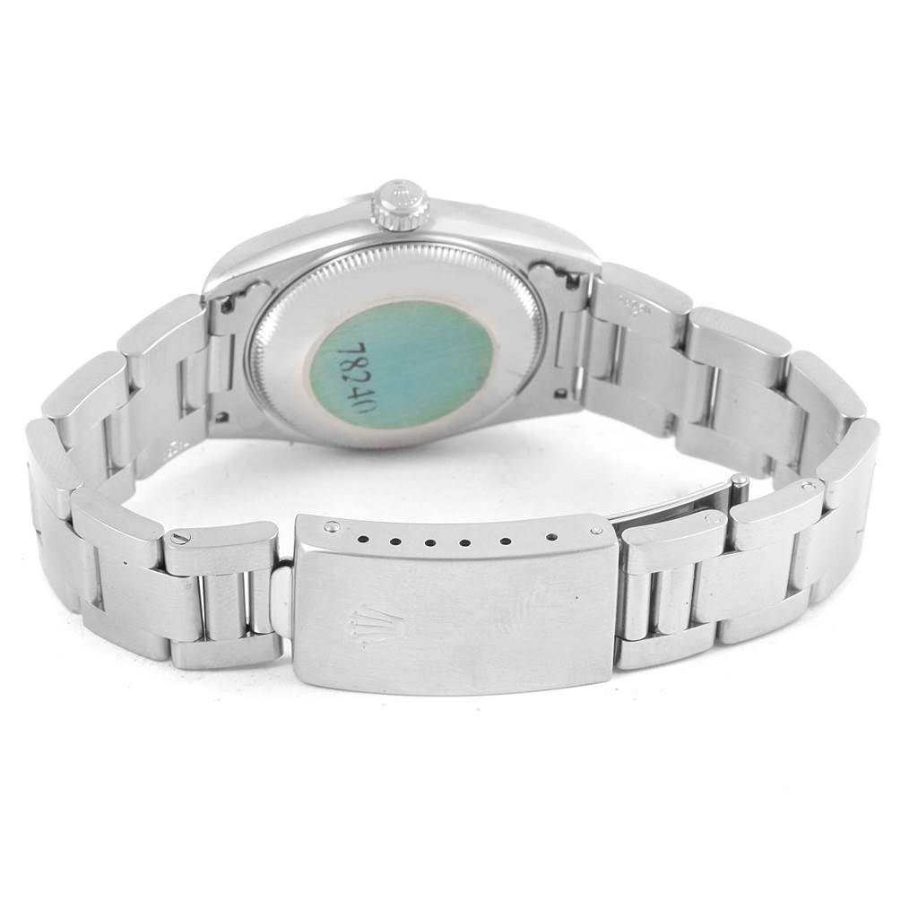 This image shows the back view of a Rolex Mid-Size 78240 Women's Stainless Steel Black Dial 78240 Women's Stainless Steel Black Dial model watch, highlighting the clasp and bracelet.