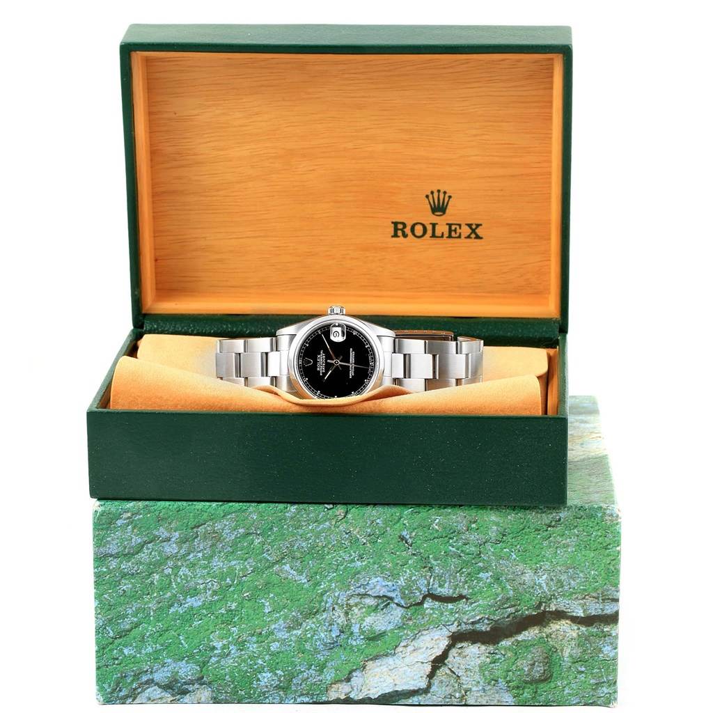 The image shows a Rolex Mid-Size 68240 Women's Stainless Steel Black Dial 68240 Women's Stainless Steel Black Dial model watch from a front angle, displayed in its branded box.