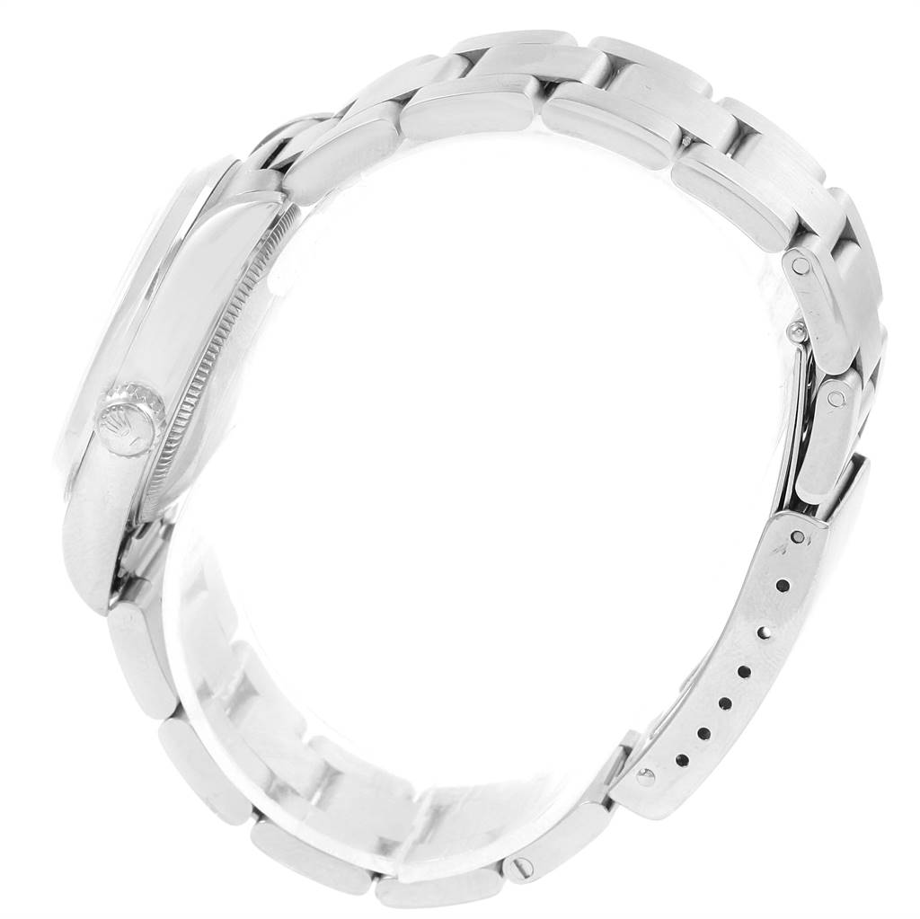 The image displays a side profile of the Mid-Size Rolex watch, showing the bracelet, clasp, and crown.