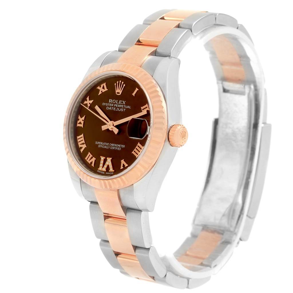 The image shows a Rolex Mid-Size 178271 Women's Steel and Gold (two tone) Brown Dial 178271 Women's Steel and Gold (two tone) Brown Dial Oyster Perpetual Datejust watch viewed at a three-quarter angle, highlighting its dial and bracelet.