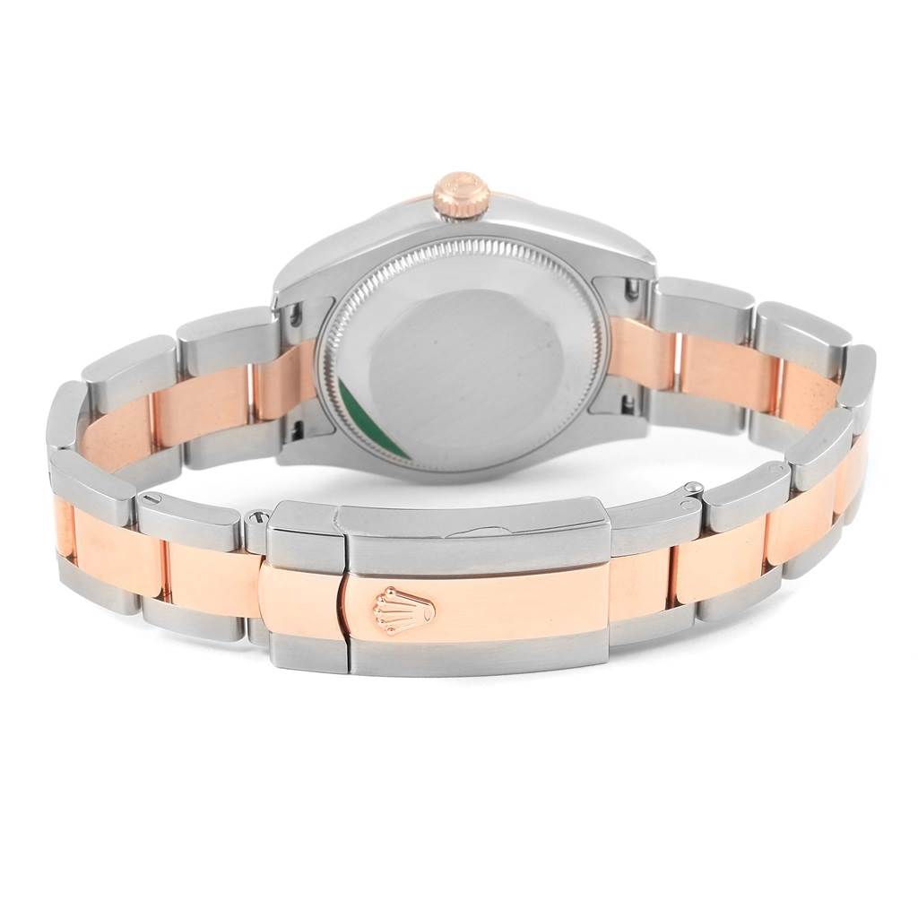 The image shows the back view of a Rolex Mid-Size 178271 Women's Steel and Gold (two tone) Brown Dial 178271 Women's Steel and Gold (two tone) Brown Dial watch, highlighting the case back, crown, and two-tone bracelet with clasp.