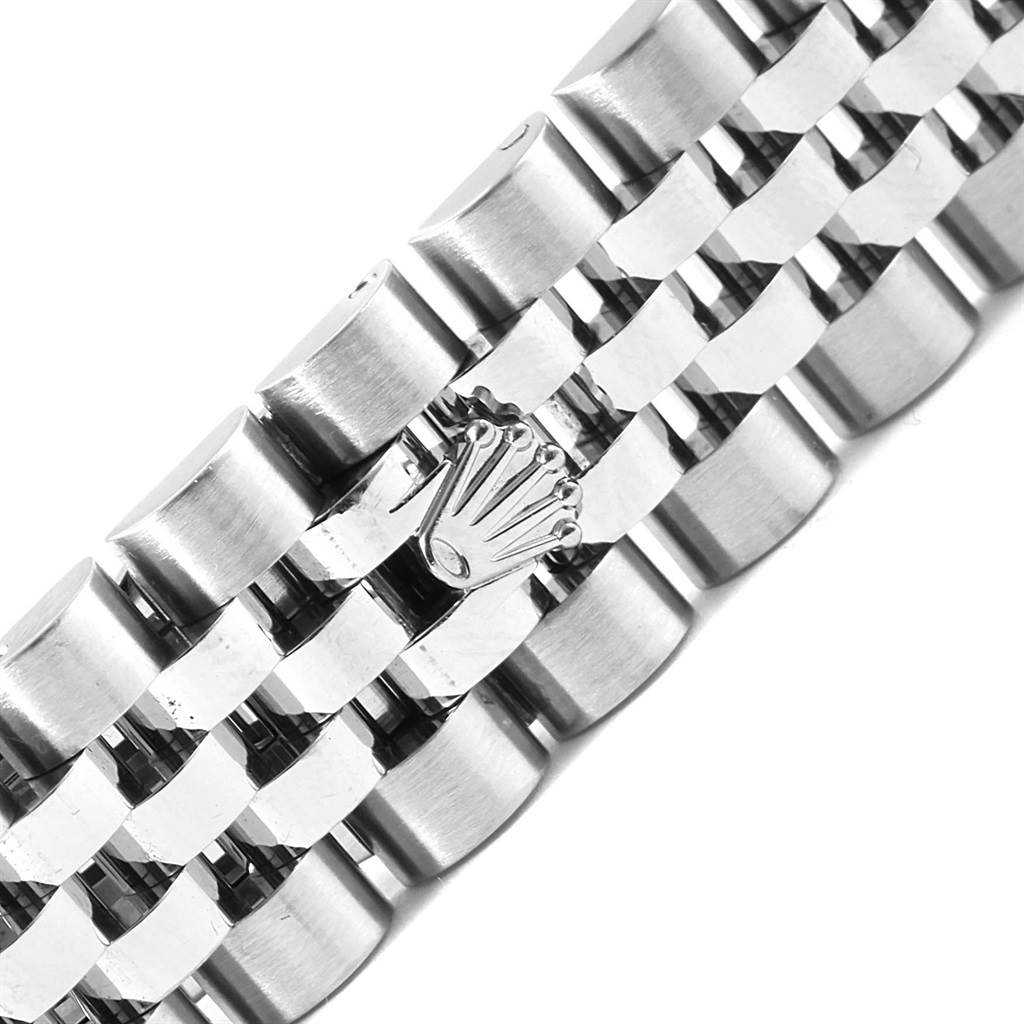 This image shows a close-up of the stainless steel bracelet of a Rolex Mid-Size 178274 Women's Stainless Steel Black Dial 178274 Women's Stainless Steel Black Dial model, highlighting the Rolex crown logo on the clasp.