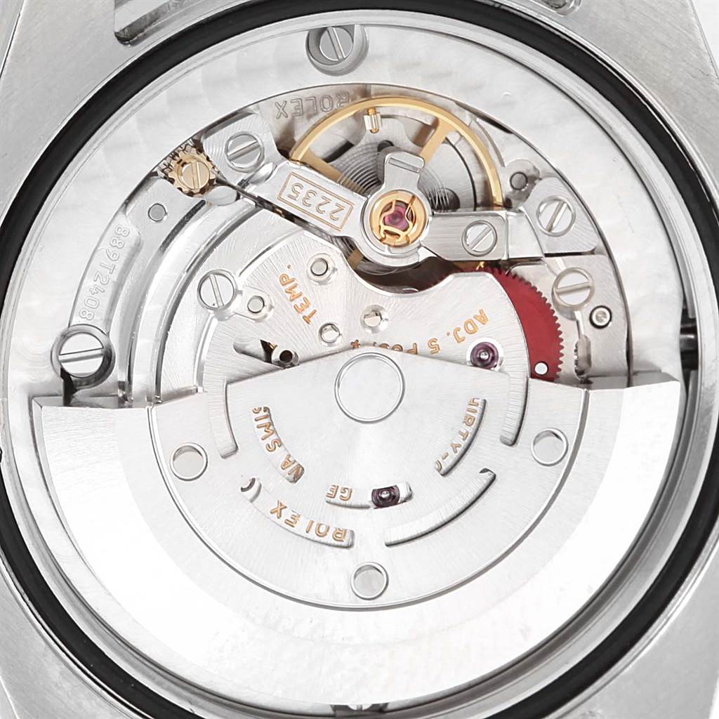 This image shows a close-up of the internal mechanism and movement of a Rolex Mid-Size 178274 Women's Stainless Steel Black Dial 178274 Women's Stainless Steel Black Dial model watch.