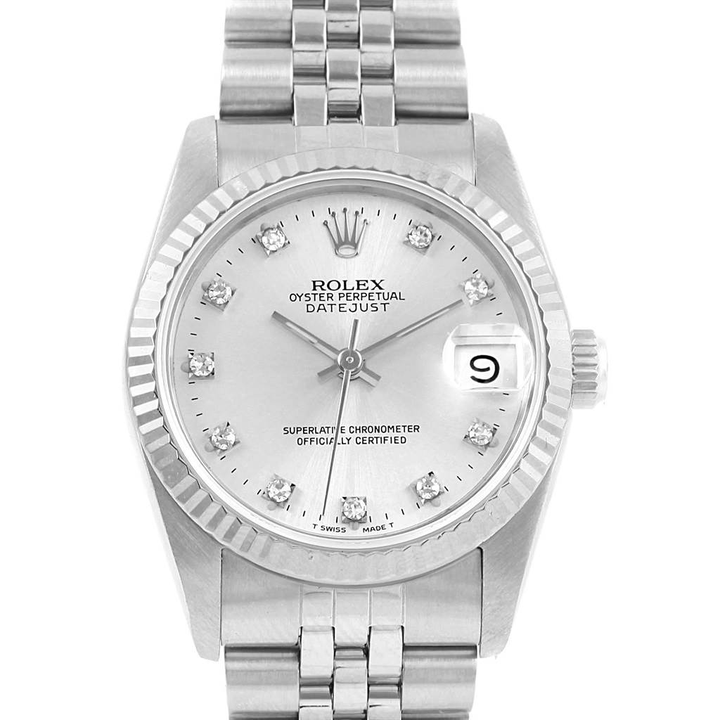 The image shows a frontal view of a Rolex Oyster Perpetual Datejust Mid-Size watch with a metallic bracelet.