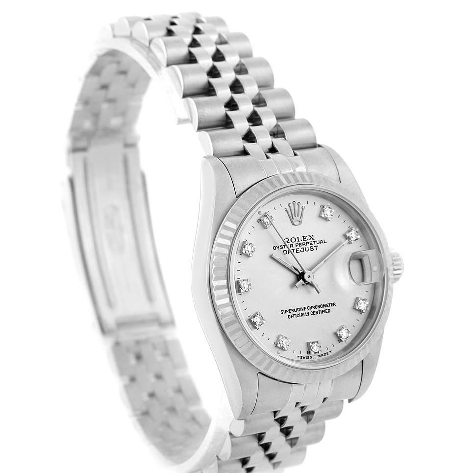 The image shows a side angle of the Mid-Size Rolex Datejust, highlighting its dial, fluted bezel, and Jubilee bracelet.