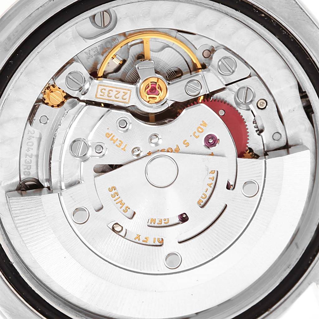 The image shows the movement mechanism of a Rolex Mid-Size 178274 Women's Stainless Steel White Dial 178274 Women's Stainless Steel White Dial model watch, viewed from the back.