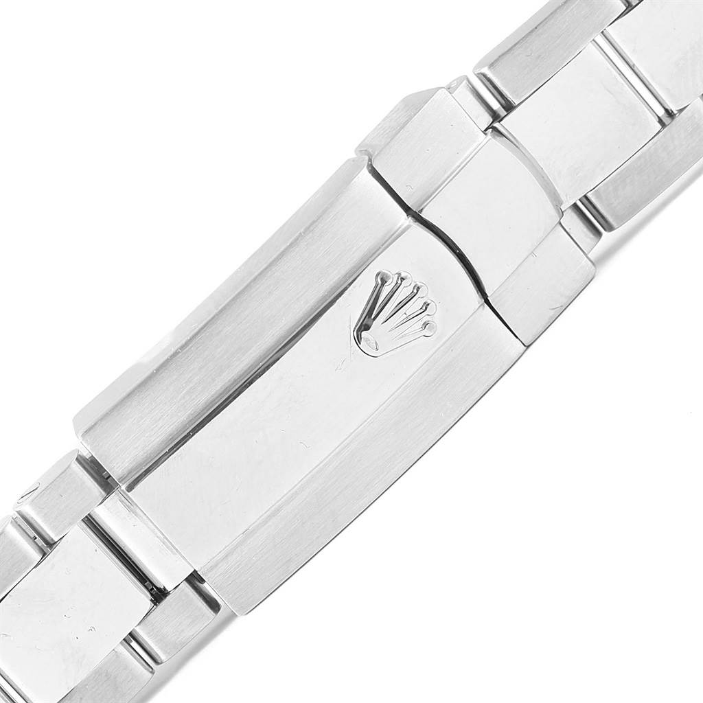 This image shows the clasp of the bracelet on a mid-size Rolex watch, featuring the Rolex logo.