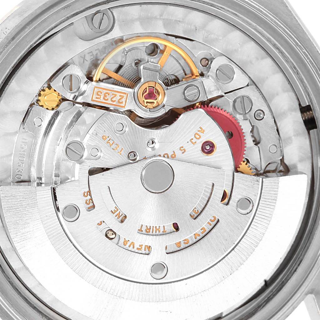 This is the internal mechanism of a Mid-Size Rolex watch shown from a direct, top-down angle.