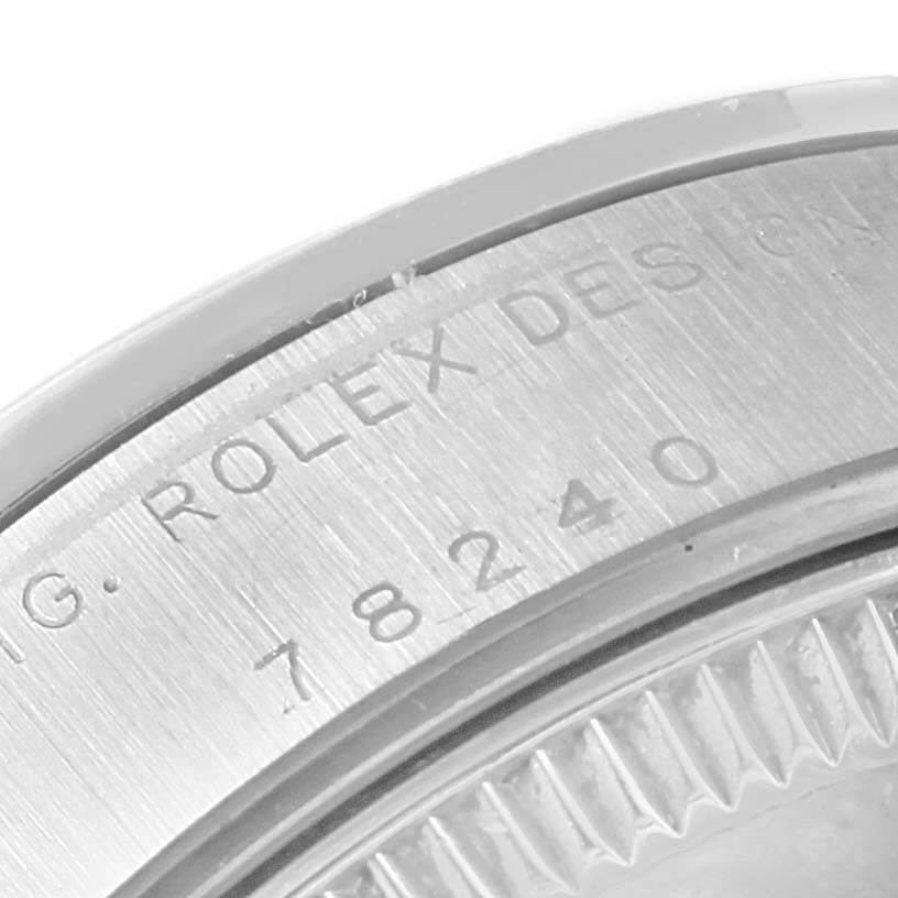 This image shows a close-up of the case back edge of a Mid-Size Rolex watch model 78240 with engraved text.