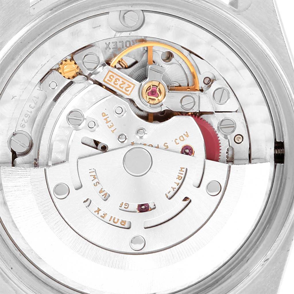 This image shows the internal mechanism and movement of a Mid-Size Rolex watch from a top-down angle.