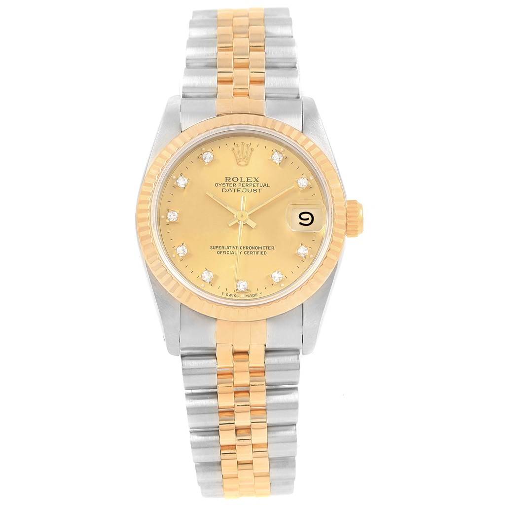 The Rolex Mid-Size 68273 Women's Steel and Gold (two tone) Champagne Dial 68273 Women's Steel and Gold (two tone) Champagne Dial Datejust watch is shown from a top-down angle, revealing its face, bezel, crown, and two-tone bracelet.
