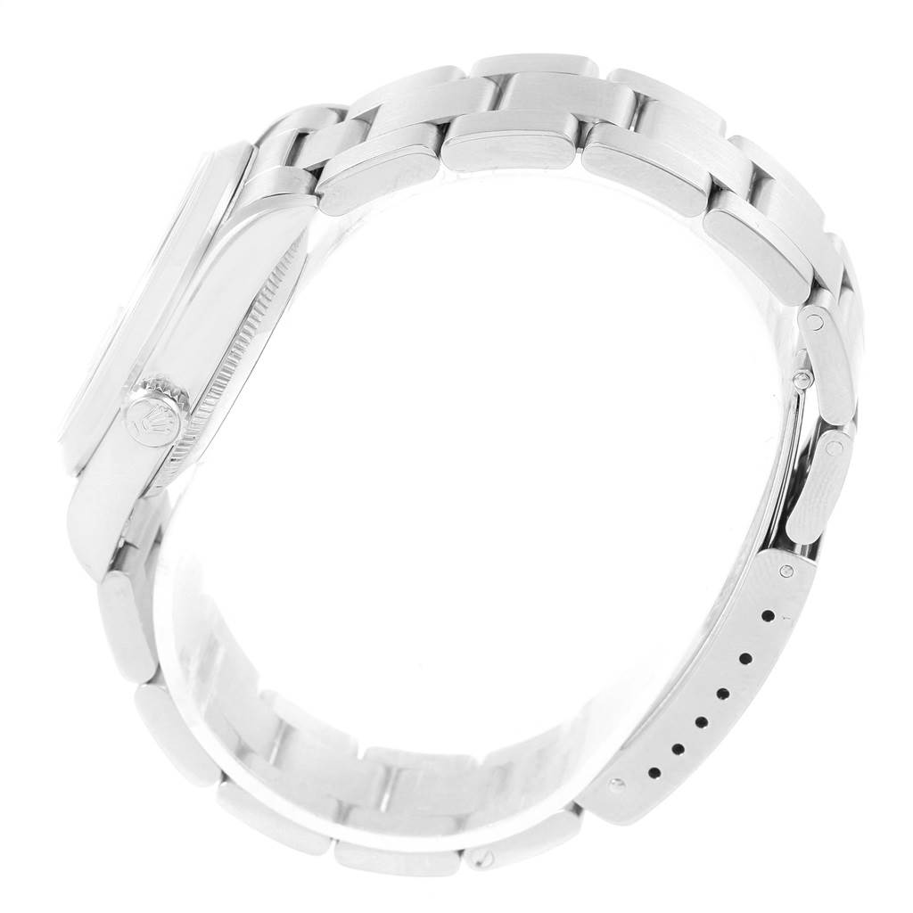 The image shows a side view of a Rolex Mid-Size 78240 Women's Stainless Steel Silver Dial 78240 Women's Stainless Steel Silver Dial model watch, highlighting the bracelet, clasp, and crown.