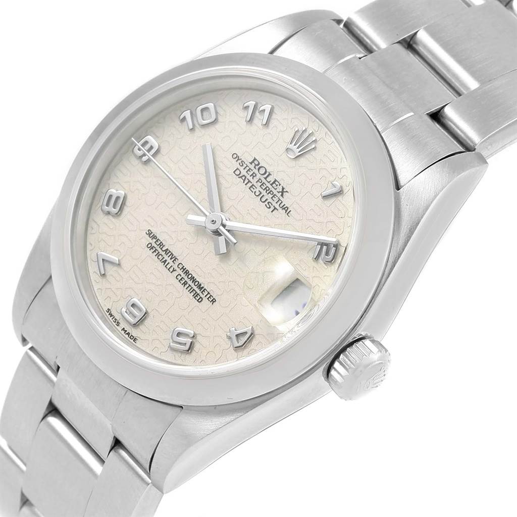 This image showcases a close-up view of the face, bezel, and part of the bracelet of a Rolex Mid-Size 78240 Women's Stainless Steel Silver Dial 78240 Women's Stainless Steel Silver Dial Oyster Perpetual Datejust watch.