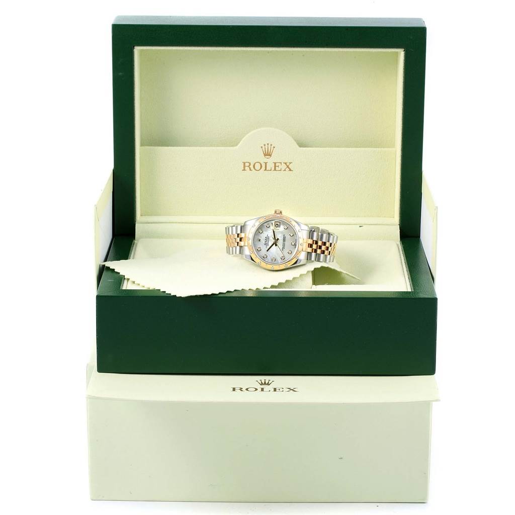 The image shows a Rolex Mid-Size 178343 Women's Steel and Gold (two tone) Mother of Pearl Dial 178343 Women's Steel and Gold (two tone) Mother of Pearl Dial watch displayed in an open green Rolex box, revealing the dial and bracelet.