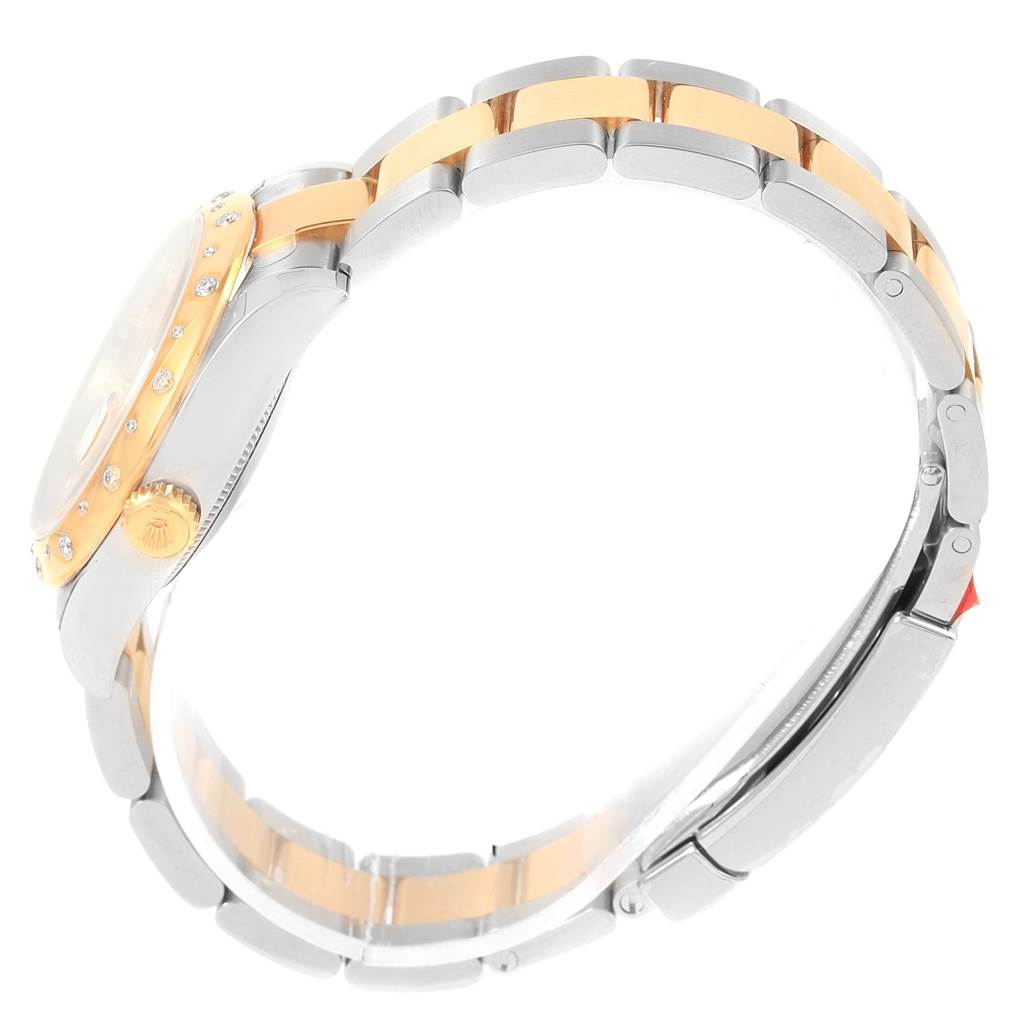 The image shows a side view of a Rolex Mid-Size 178343 Women's Steel and Gold (two tone) Champagne Dial 178343 Women's Steel and Gold (two tone) Champagne Dial watch focusing on the case, bezel, crown, and bracelet.