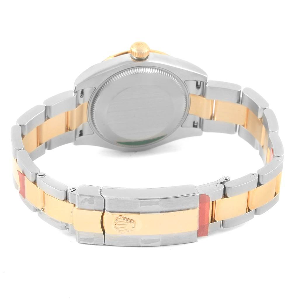 The image shows the back view of a Rolex Mid-Size 178343 Women's Steel and Gold (two tone) Champagne Dial 178343 Women's Steel and Gold (two tone) Champagne Dial model, including the case back and part of the bracelet with clasp.