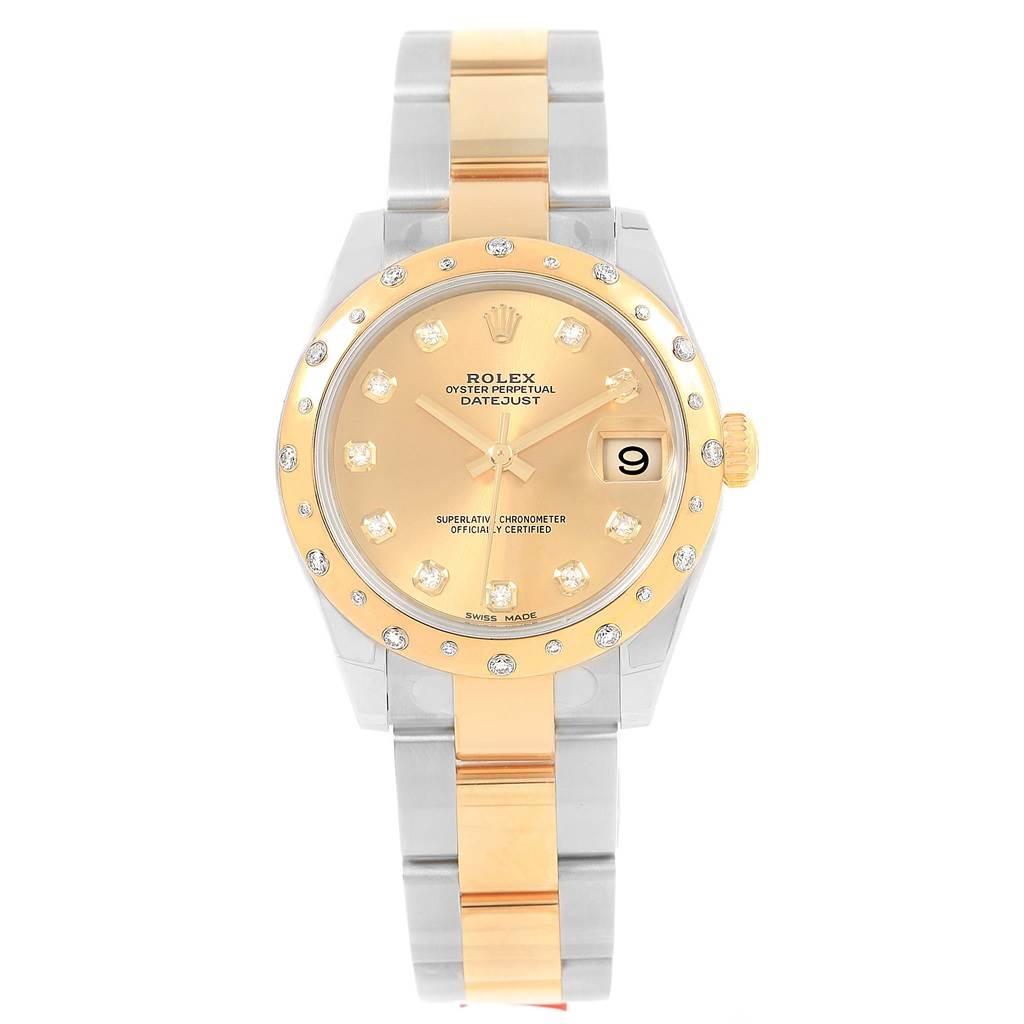 This Rolex Oyster Perpetual Datejust Mid-Size model is shown from a top-down angle, displaying its dial, bezel, and bracelet.