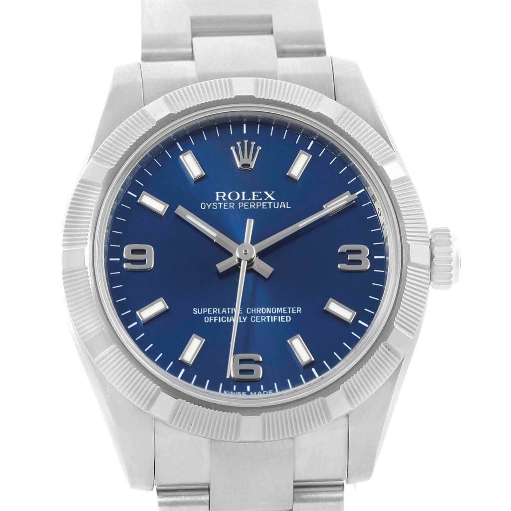 The image shows a front view of the Rolex Mid-Size 177210 Women's Stainless Steel Blue Dial 177210 Women's Stainless Steel Blue Dial Oyster Perpetual watch, highlighting its blue dial and stainless steel bracelet.