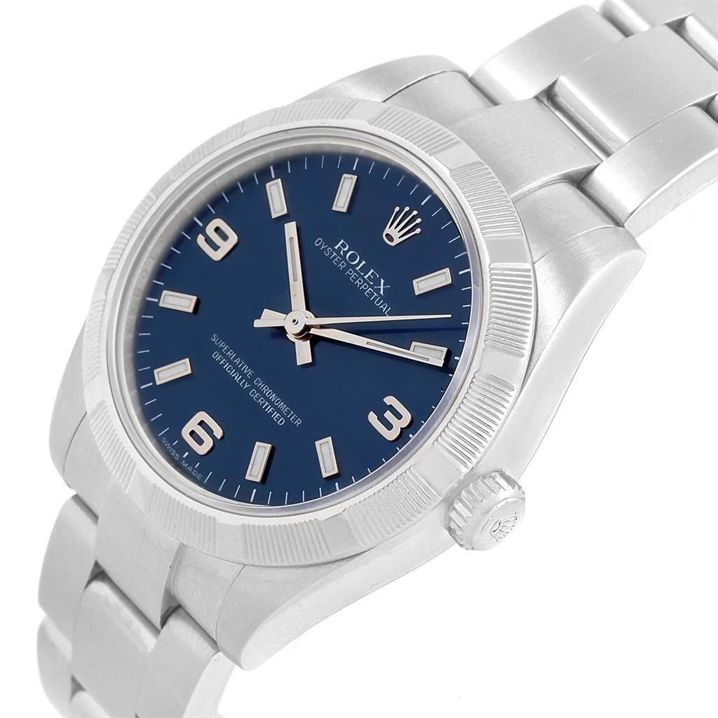 The image shows a side angle of a Rolex Mid-Size 177210 Women's Stainless Steel Blue Dial 177210 Women's Stainless Steel Blue Dial model, featuring the dial, bezel, crown, and bracelet.