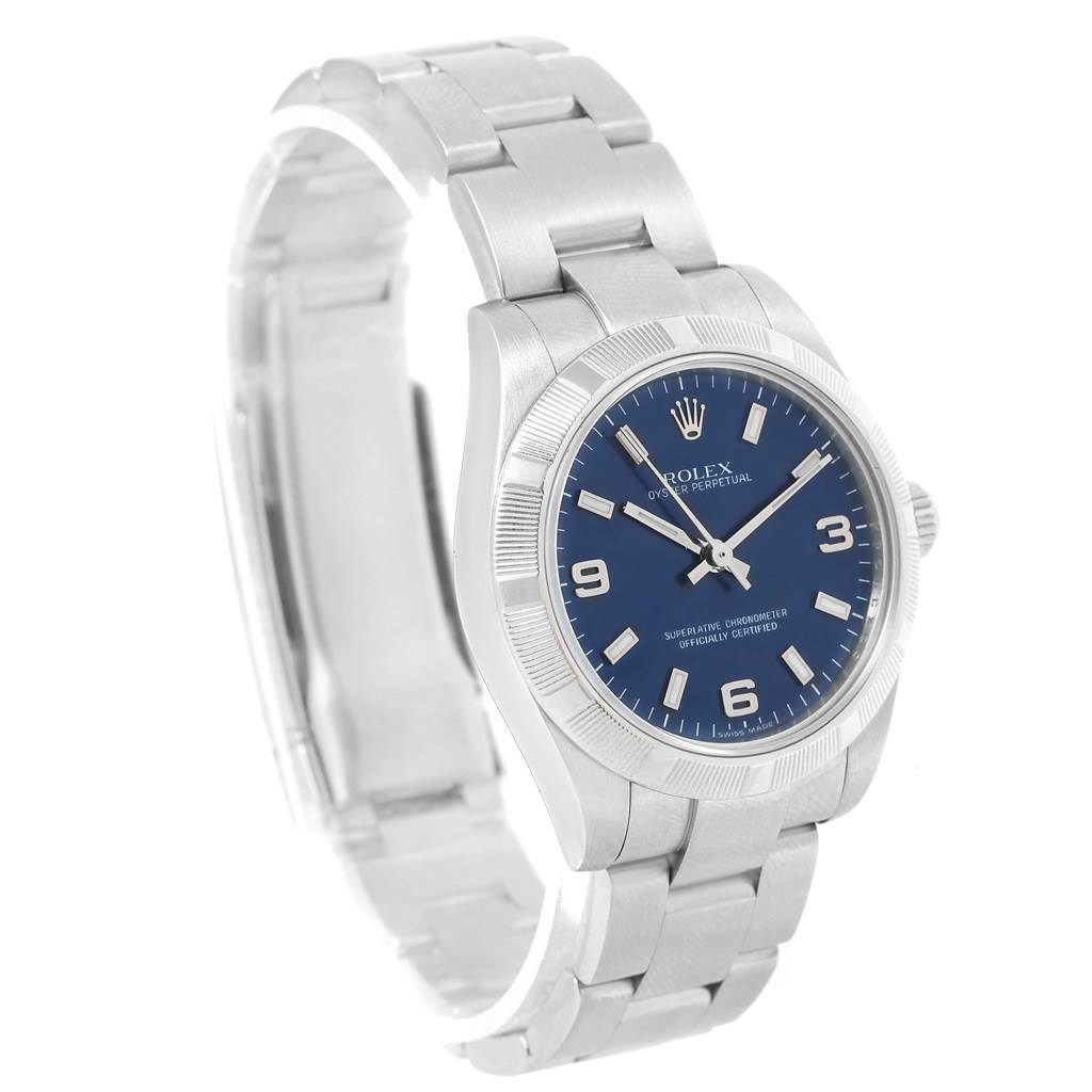 The image shows a Rolex Mid-Size 177210 Women's Stainless Steel Blue Dial 177210 Women's Stainless Steel Blue Dial model watch at a slight angle, highlighting its blue dial, bezel, and metallic bracelet.
