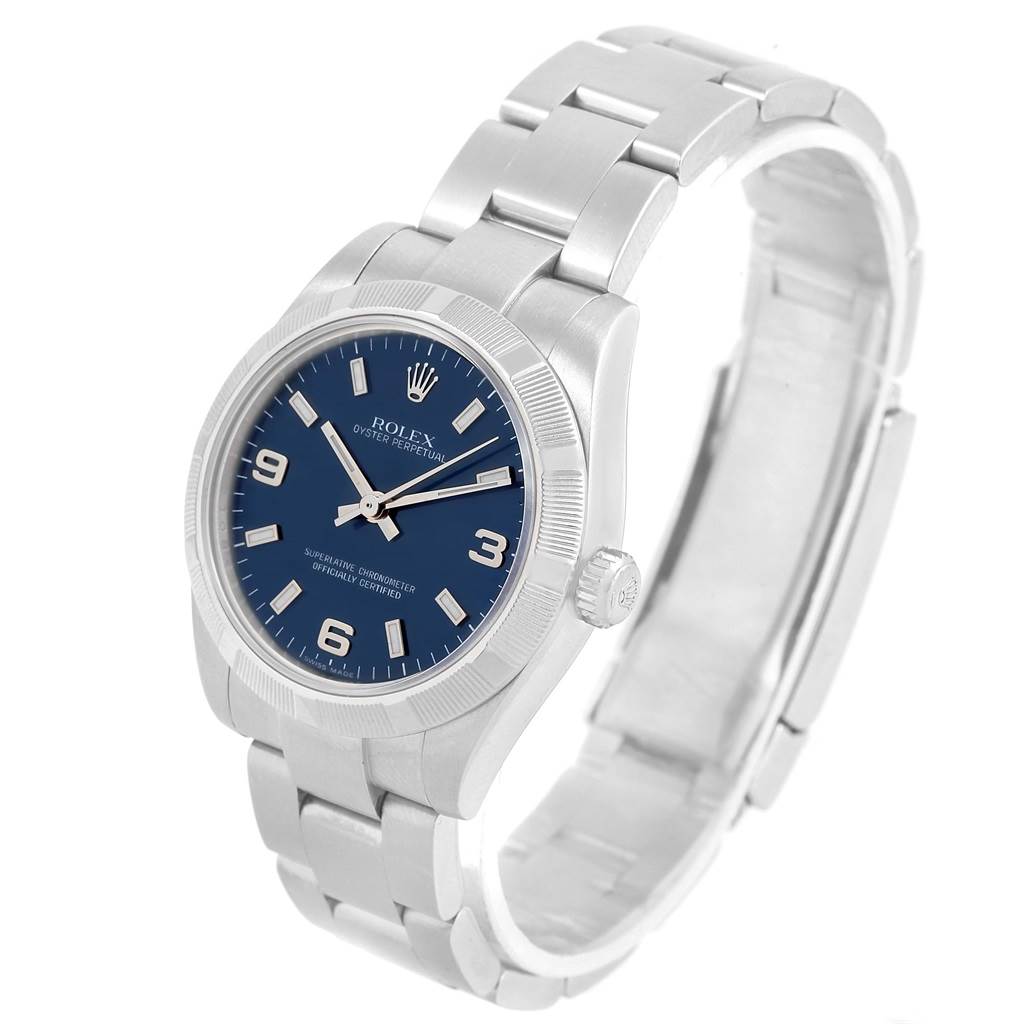 The Mid-Size Rolex watch is shown at a three-quarter angle displaying the face, bezel, crown, and bracelet.