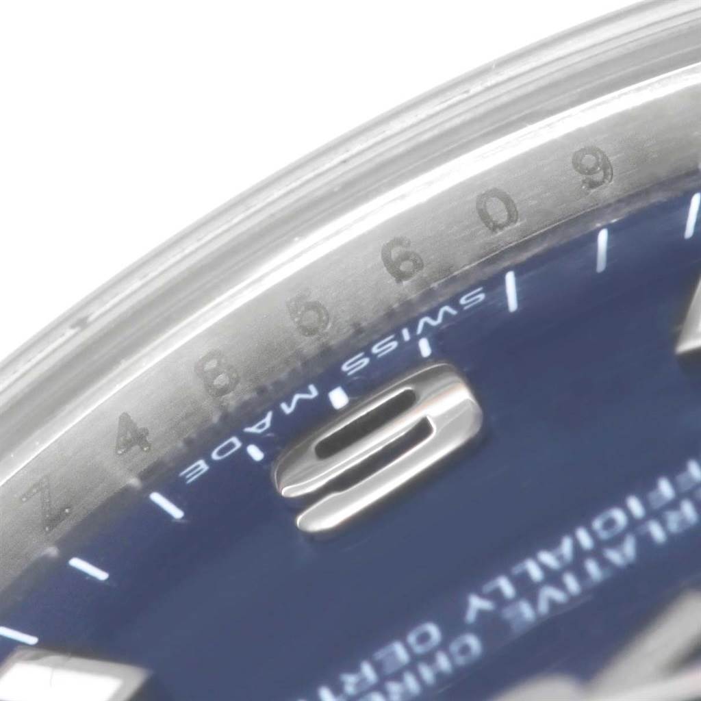 This close-up image shows the dial and part of the bezel of a Rolex Mid-Size 177210 Women's Stainless Steel Blue Dial 177210 Women's Stainless Steel Blue Dial watch, highlighting the numeric markers.