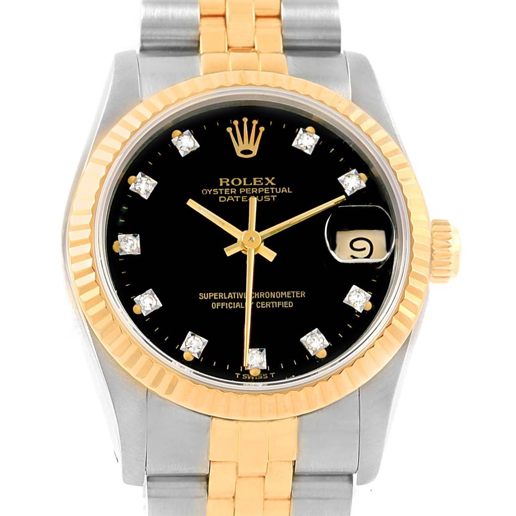 The image shows a front view of a Mid-Size Rolex Datejust watch, highlighting its two-tone bracelet, black dial, and date window.
