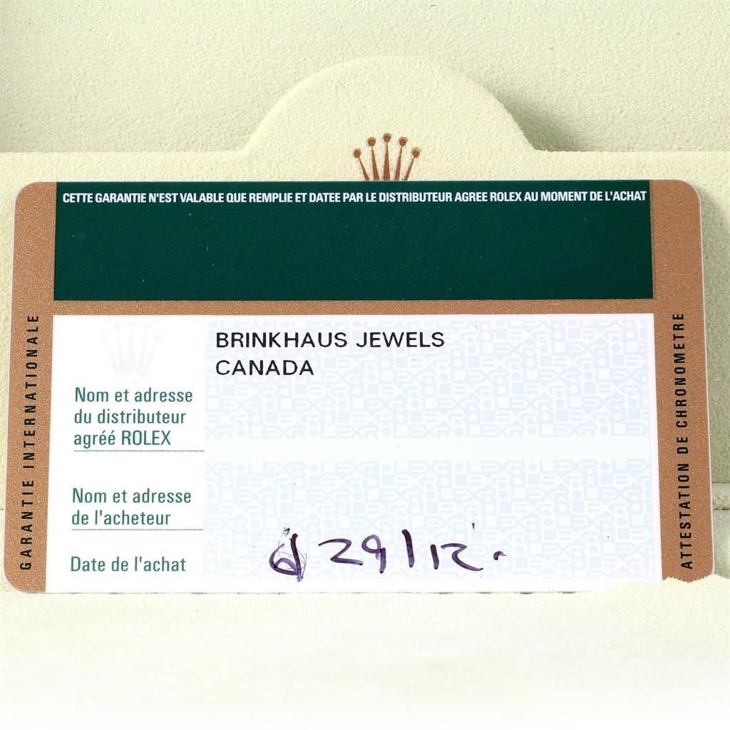 This image shows the international warranty card for a Mid-Size Rolex watch.