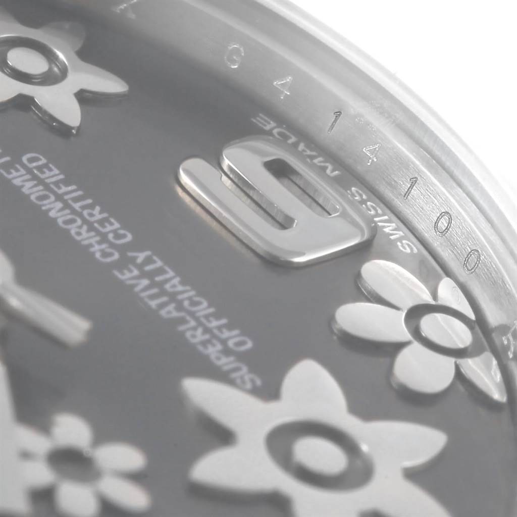 This close-up image of the Rolex Mid-Size 178274 Women's Stainless Steel Grey Dial 178274 Women's Stainless Steel Grey Dial watch shows the dial, partial numerals, text, and decorative elements.