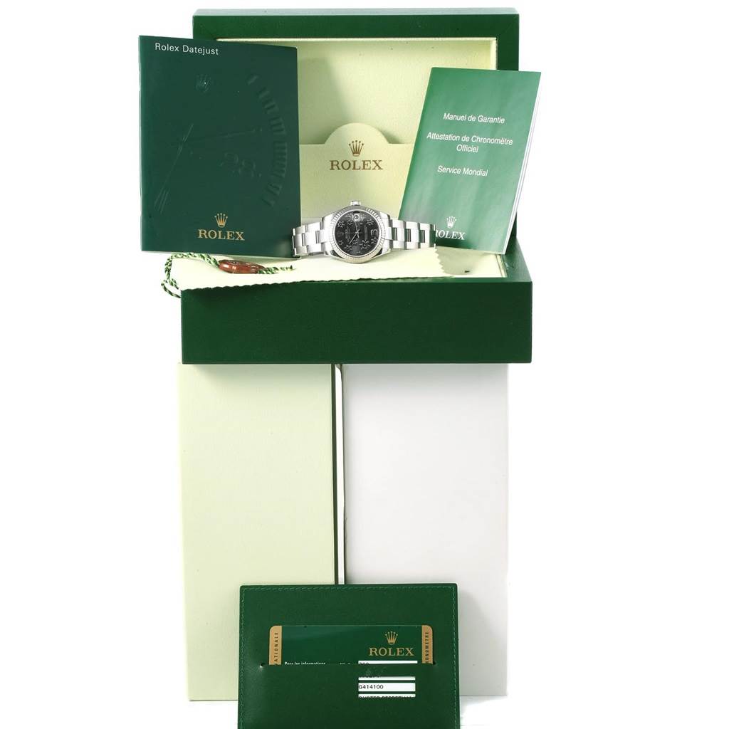 The image shows a Rolex Mid-Size 178274 Women's Stainless Steel Grey Dial 178274 Women's Stainless Steel Grey Dial watch with manuals, warranty card, and original green packaging from a front angle.