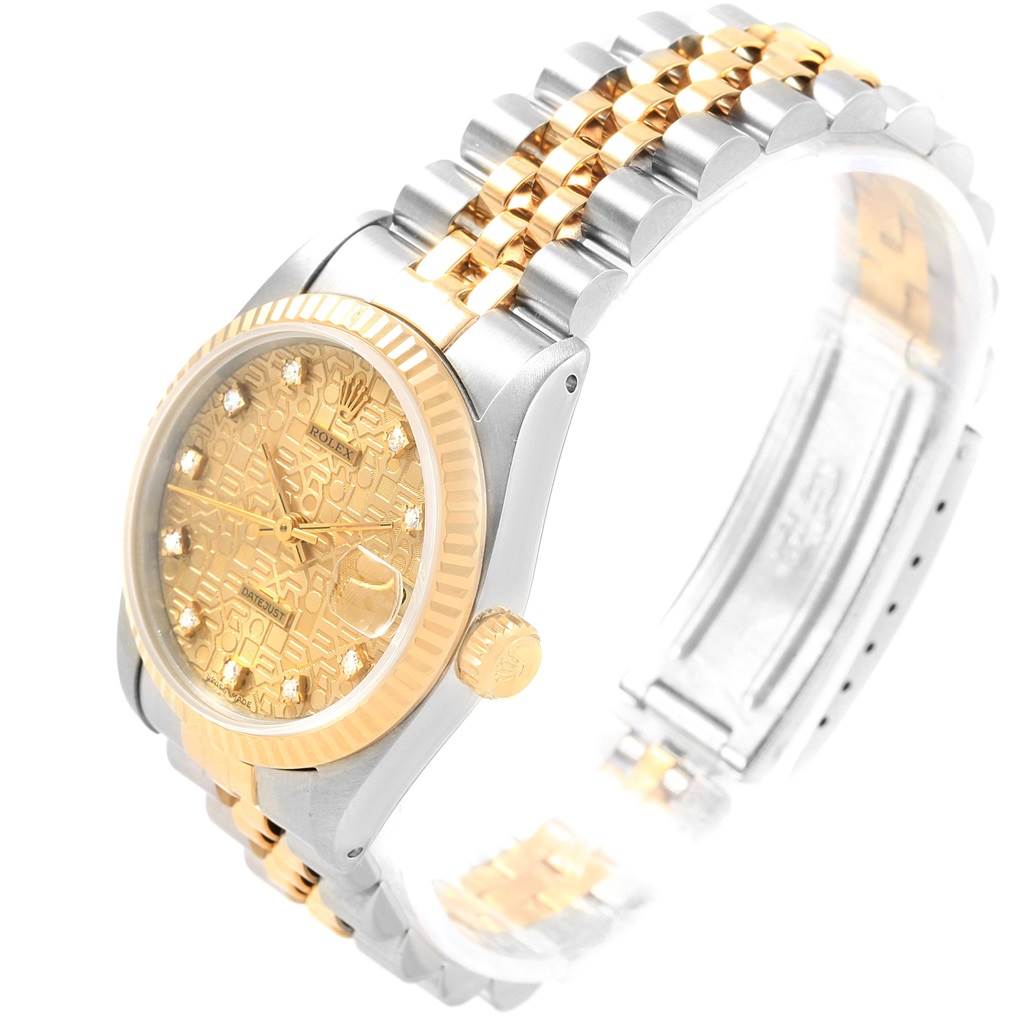 This image shows a Rolex Mid-Size 68273 Women's Steel and Gold (two tone) Champagne Dial 68273 Women's Steel and Gold (two tone) Champagne Dial model at an angle that highlights the dial, case, and part of the bracelet.