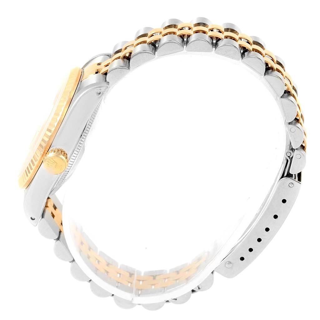 The image shows a side view of a Mid-Size Rolex watch, displaying the crown, bezel, and two-tone bracelet.