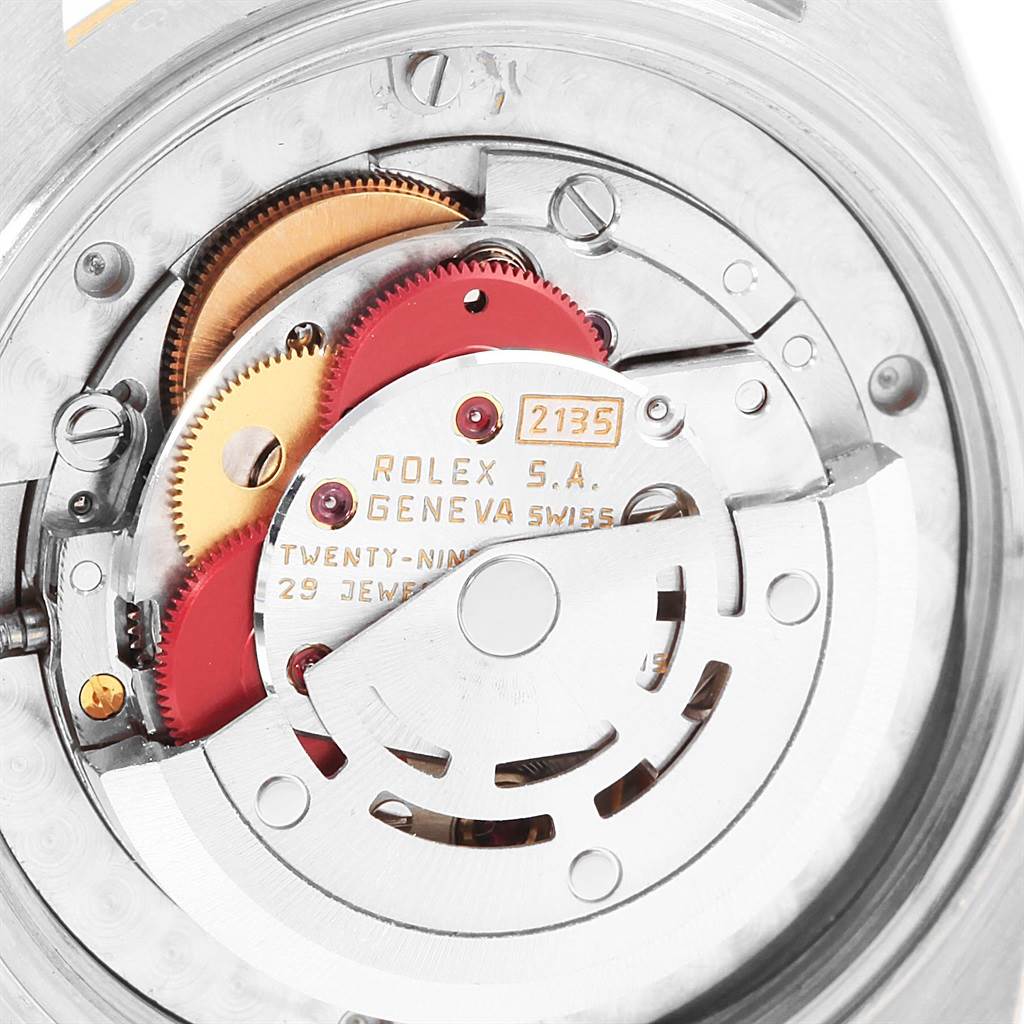 This image shows a close-up of the movement and inner mechanisms of a Rolex Mid-Size 68273 Women's Steel and Gold (two tone) Champagne Dial 68273 Women's Steel and Gold (two tone) Champagne Dial model watch.