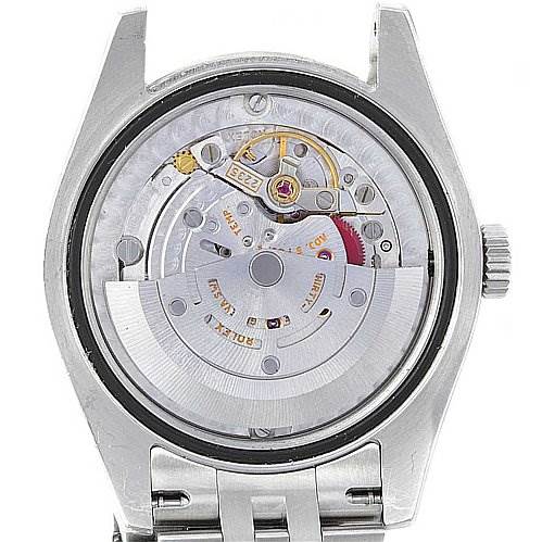 This image shows the open case back of a Rolex Mid-Size 178274 Stainless Steel White Dial 178274 Stainless Steel White Dial model, revealing its intricate mechanical movement and rotor.