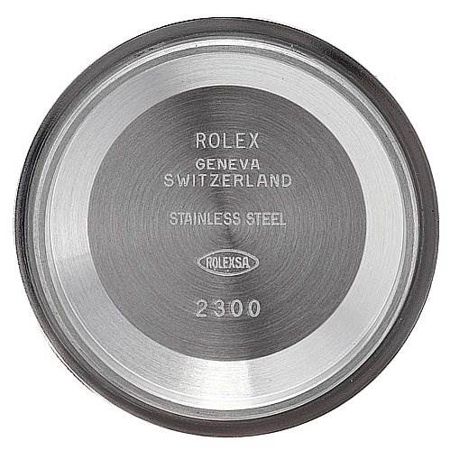 This image shows the stainless steel case back of a Mid-Size Rolex watch, viewed from above.