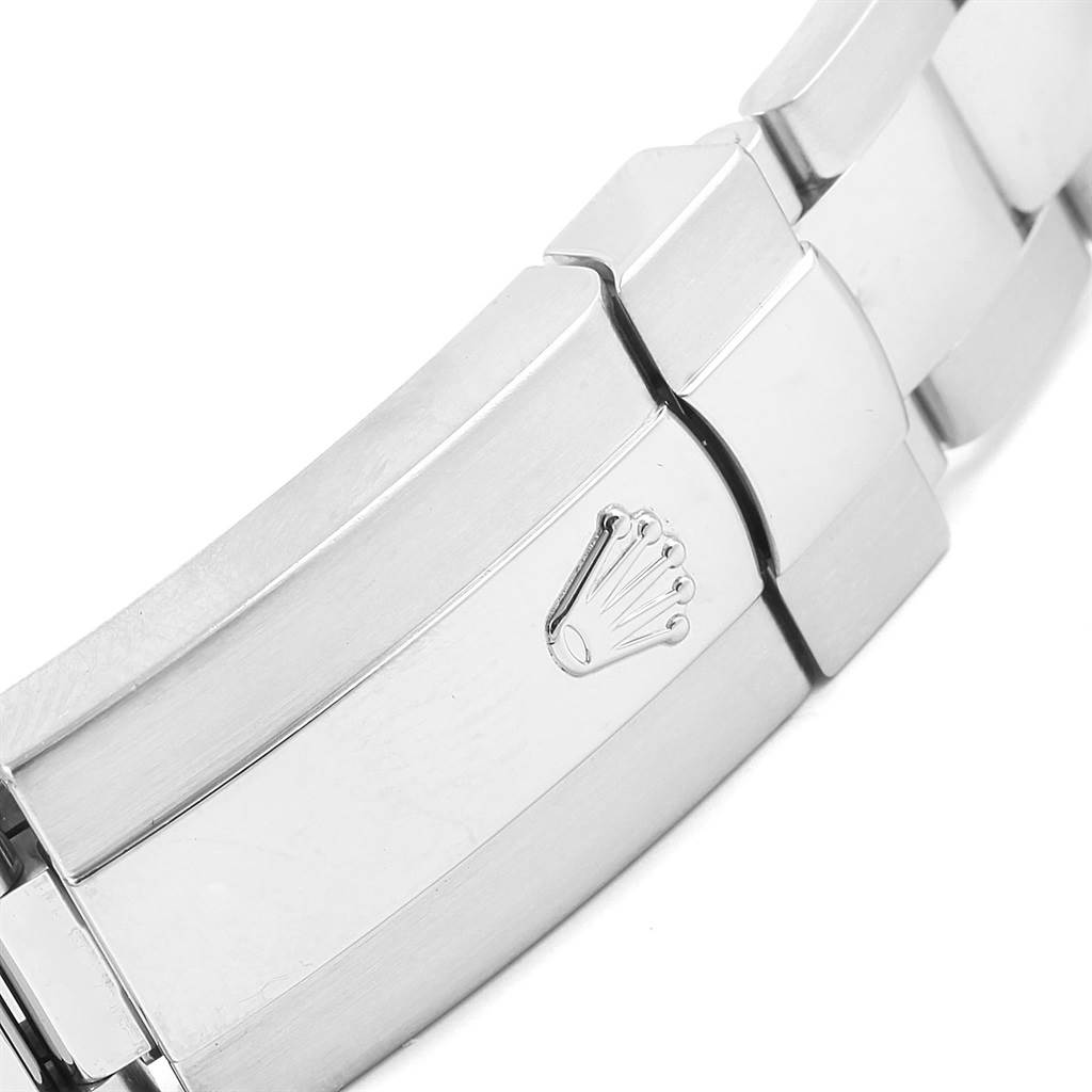This image shows a close-up angle of the clasp on a Mid-Size Rolex watch bracelet.