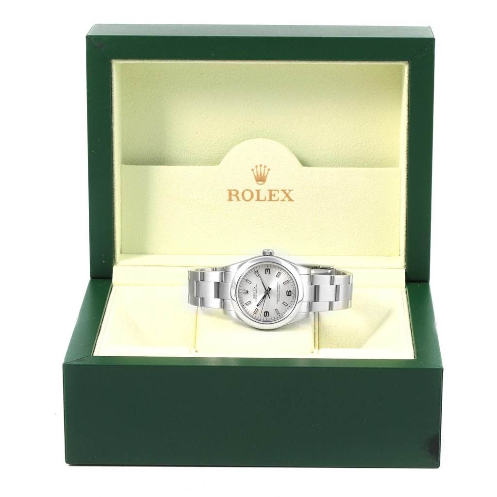 This image shows a Rolex Mid-Size 177200 Women's Stainless Steel Silver Dial 177200 Women's Stainless Steel Silver Dial watch from the front, placed inside its green and cream presentation box.