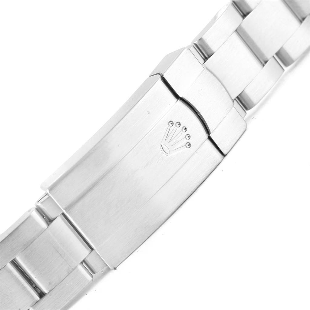 The image shows a close-up of the clasp and part of the stainless steel bracelet of a Rolex Mid-Size 177200 Women's Stainless Steel Pink Dial 177200 Women's Stainless Steel Pink Dial model.